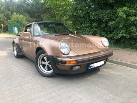 https://cloud.leparking.fr/2021/11/16/04/10/porsche-911-g-modell-cabrio-930-turbo-cabrio-braun_8338214460.jpg