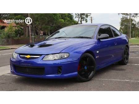 1:18 CLASSIC CARLECTABLES Holden Hj Monaro GTS Deauville Bleu Métallisé 18214 EUR 320,95